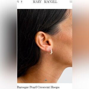 Mary MacGill Baroque Pearl crescent earrings.